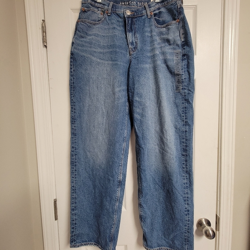 Anerican Eagle NWT Baggy Jean Medium Vintage Wash Size 14 Crossover Button.